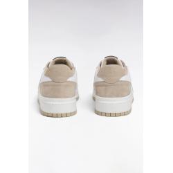 Sneakers bicolores en cuir lisse blanc et cuir suédé beige